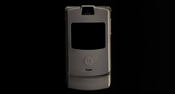 A classic Razr V3 mobile phone, featuring a sleek and slim design with a flip-open form factor.